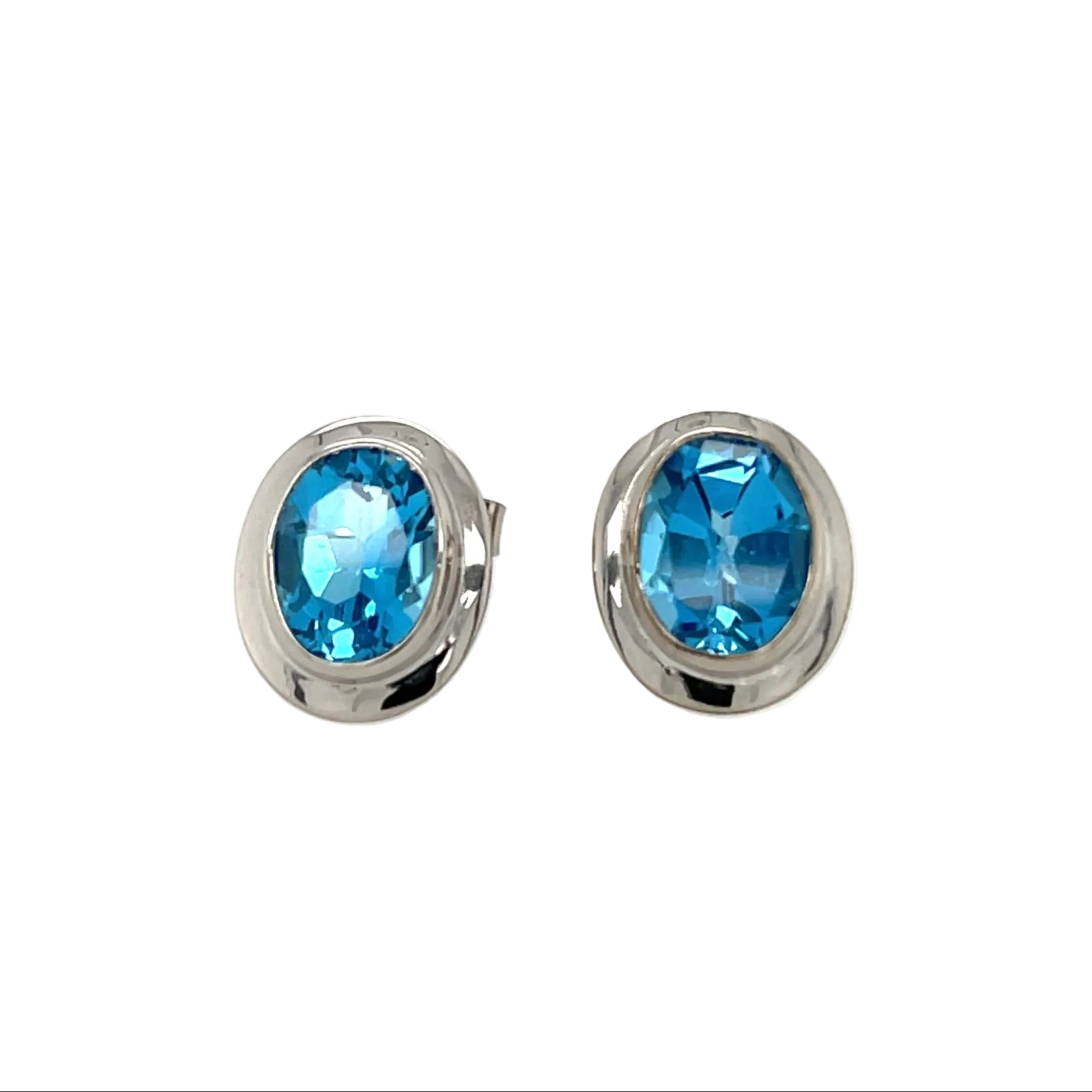 18ct White Gold 6.80ct Oval Blue Topaz Stud Earrings