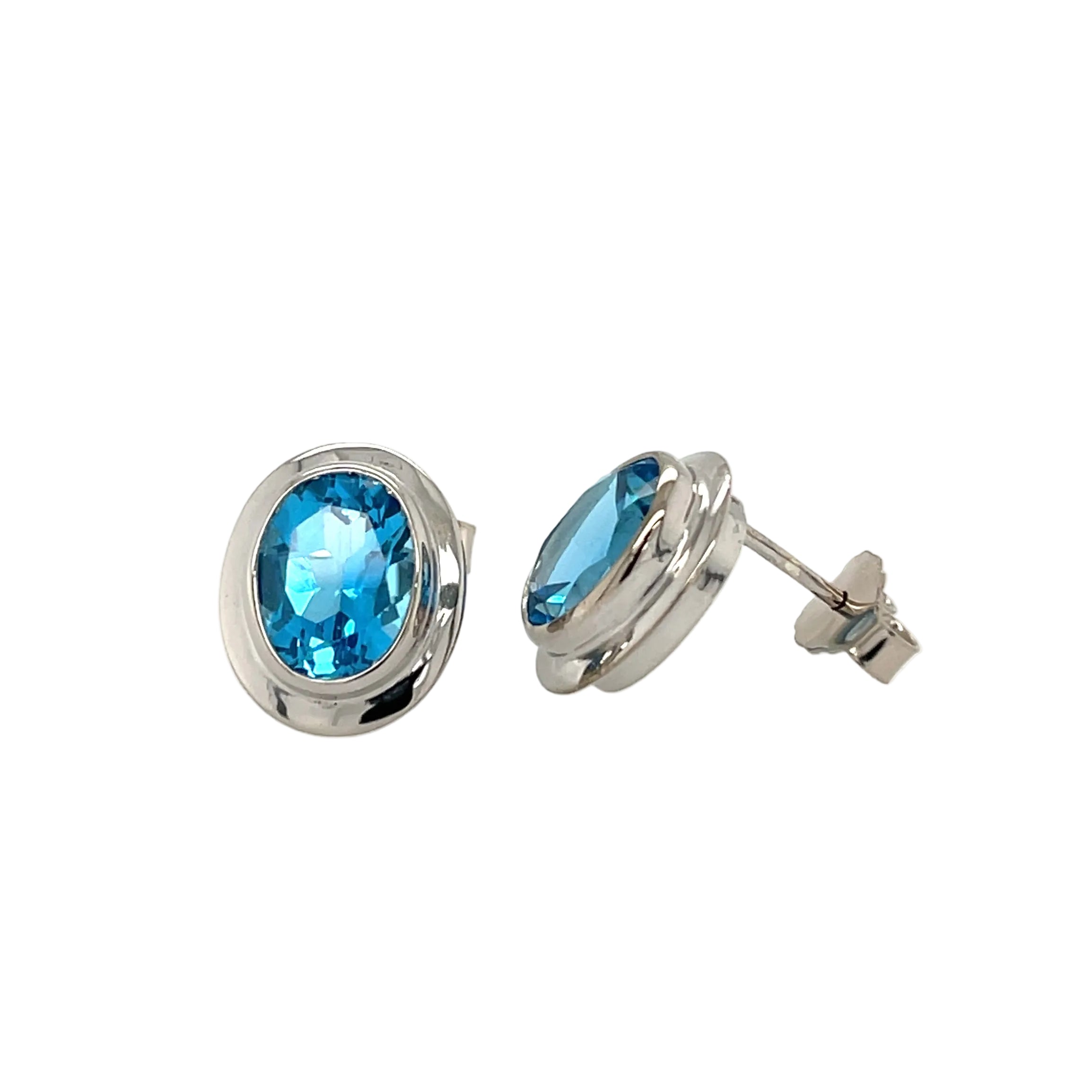 18ct White Gold 6.80ct Oval Blue Topaz Stud Earrings