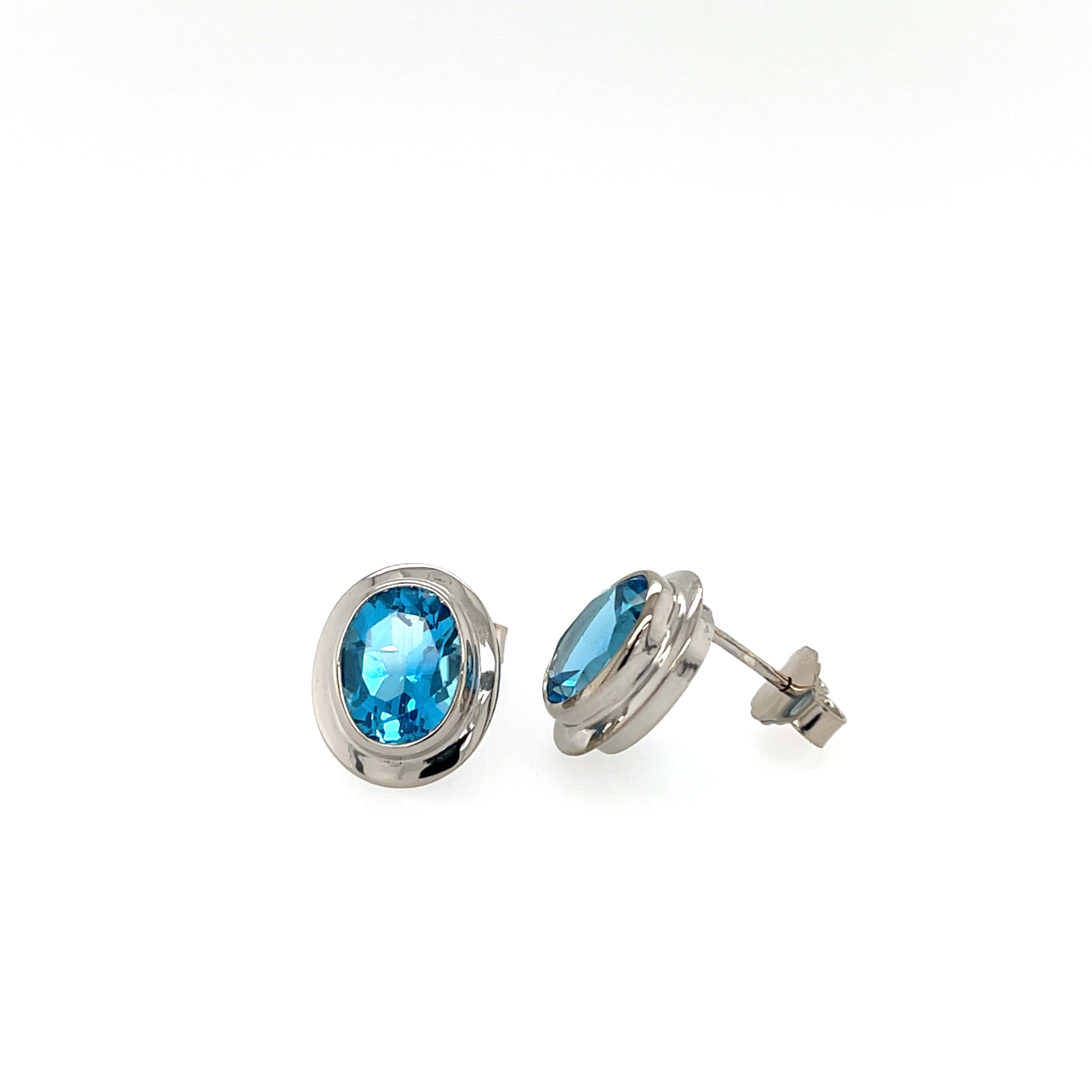18ct White Gold 6.80ct Oval Blue Topaz Stud Earrings