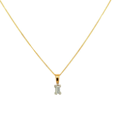 Gold necklace with a diamond pendant on a white background