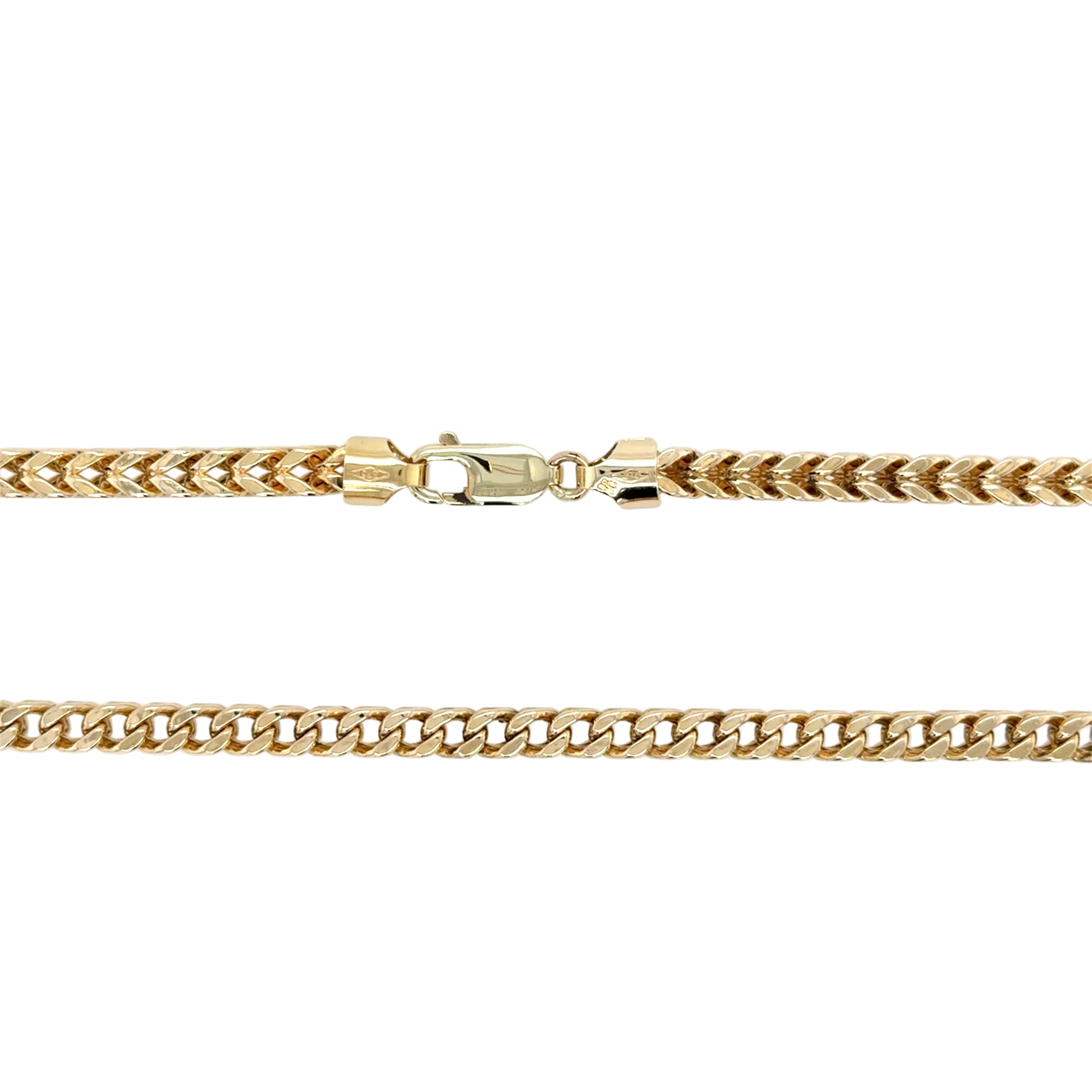 Gold chain necklace on a white background