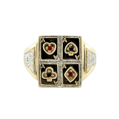 Gold ring with playing card suits design on a white background