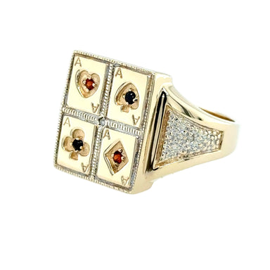 Gold ring with card suit symbols on a white background